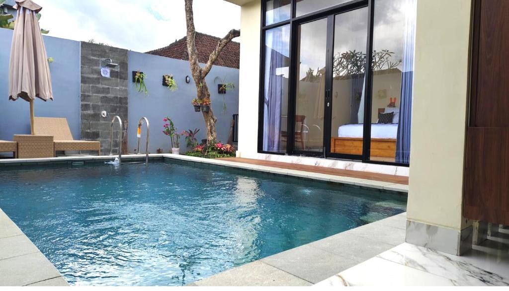 Bazén v ubytování Pondok Murni Mesari nebo v jeho okolí