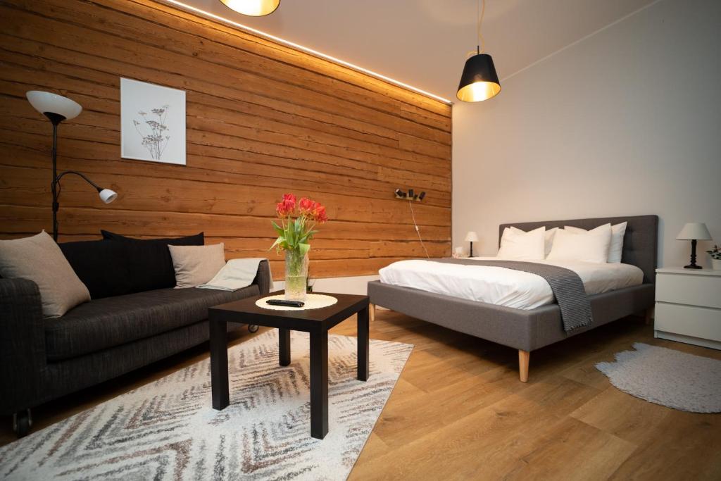 Ένα ή περισσότερα κρεβάτια σε δωμάτιο στο Sweet Escape in Rakvere Center, Perfect for Two