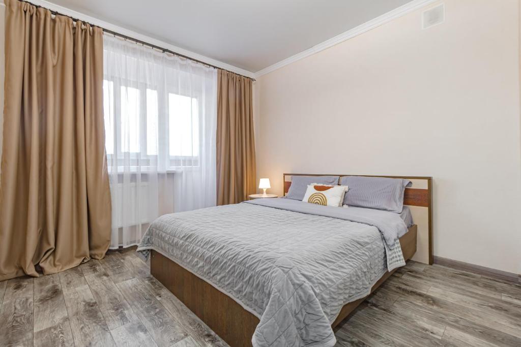 Postel nebo postele na pokoji v ubytování Круглосуточное самостоятельное заселение рядом с домом Шахмат