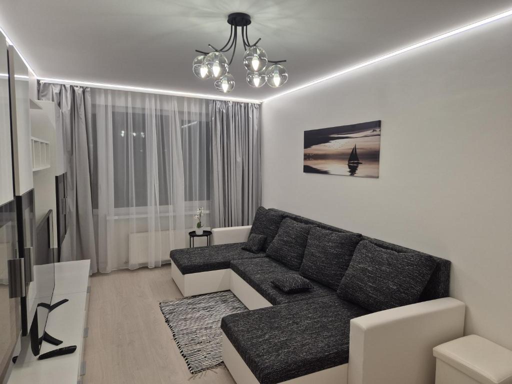 Χώρος καθιστικού στο Pilsētas sirds apartamenti