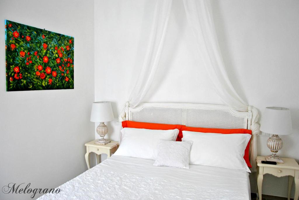 Postel nebo postele na pokoji v ubytování Bed And Breakfast Le Azalee
