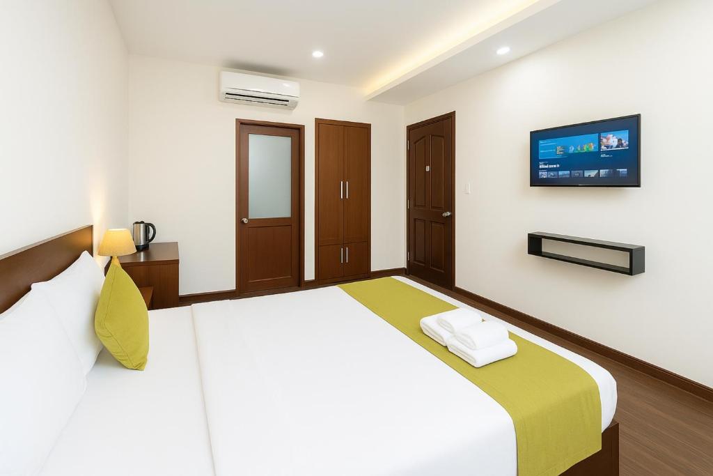 Un pat sau paturi într-o cameră la S419 Love Nest