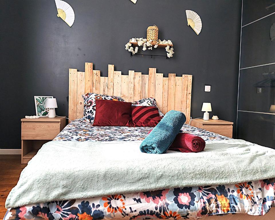 Postel nebo postele na pokoji v ubytování Cosy Vénus - T3 - balcon & Stationnement gratuit