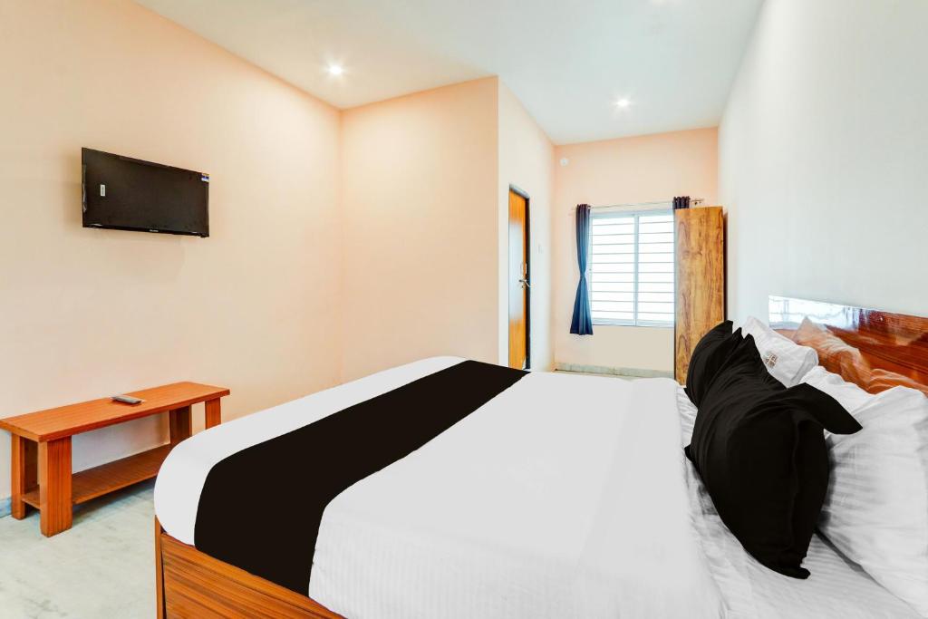 Ένα ή περισσότερα κρεβάτια σε δωμάτιο στο Super Hotel O Shine Inn