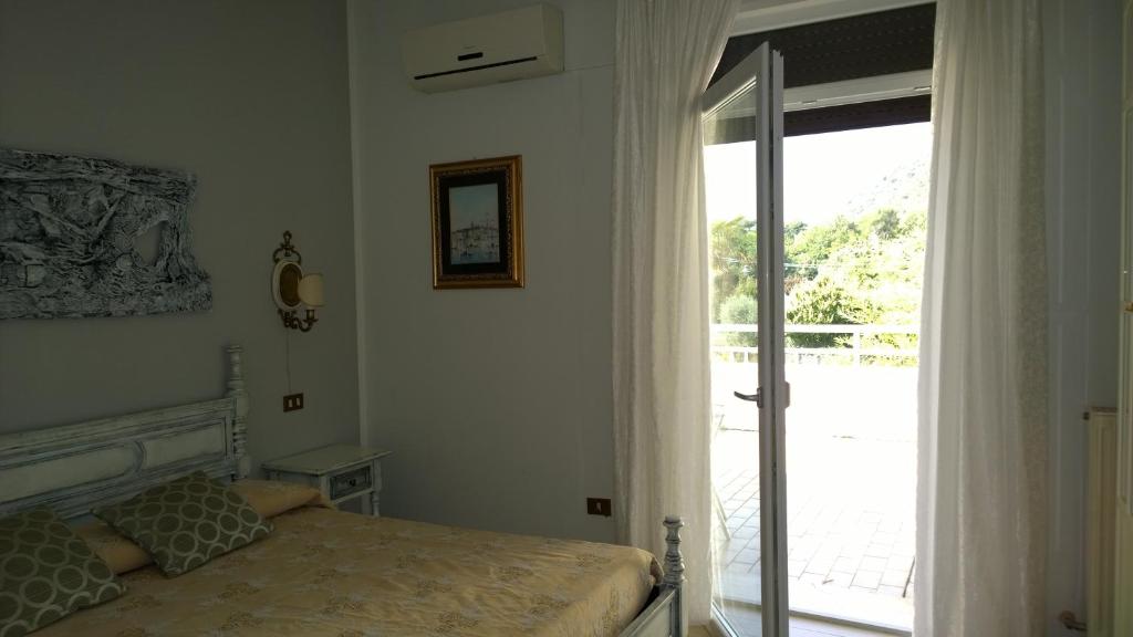 Postel nebo postele na pokoji v ubytování Hotel Cubamia