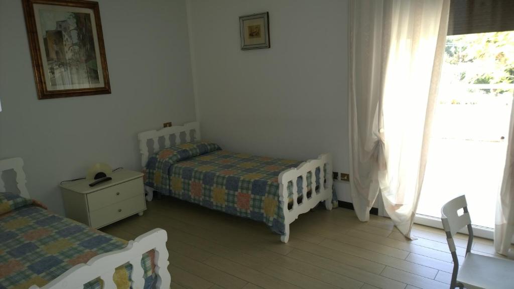 Postel nebo postele na pokoji v ubytování Hotel Cubamia