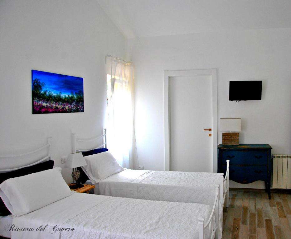 Postel nebo postele na pokoji v ubytování Bed And Breakfast Le Azalee
