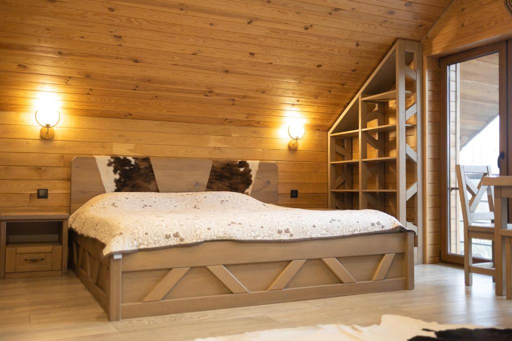 Ένα ή περισσότερα κρεβάτια σε δωμάτιο στο Елінг