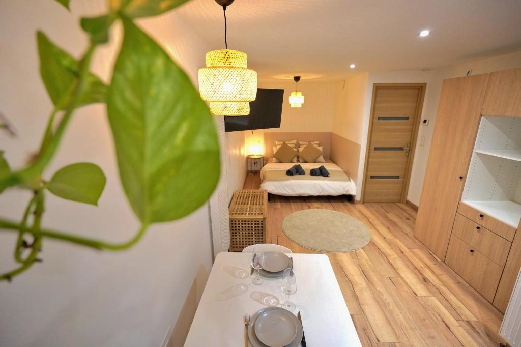 Postel nebo postele na pokoji v ubytování Le Cocon d'Obernai