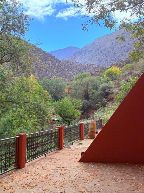 a balcony with a view of a mountain at 3A Retreat Lodge in Ourika