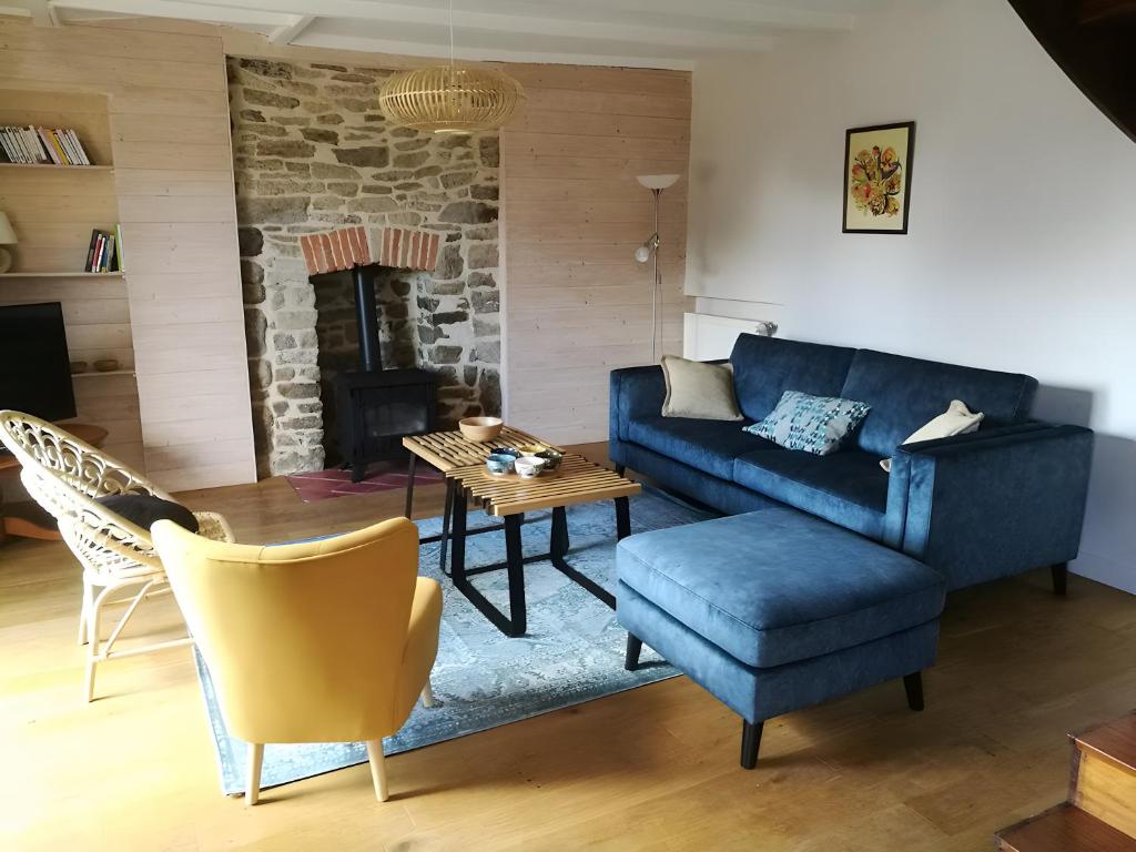 Posezení v ubytování Gite Des Roseaux