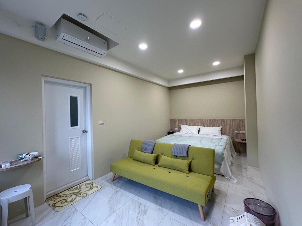 Ένα ή περισσότερα κρεβάτια σε δωμάτιο στο 草莓驛站