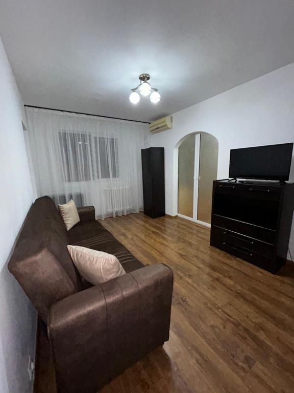 Televiisor ja/või meelelahutuskeskus majutusasutuses Alexia Residence Craiova