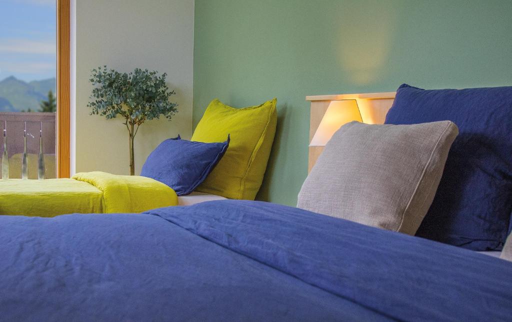 Postel nebo postele na pokoji v ubytování Hotel Dunza