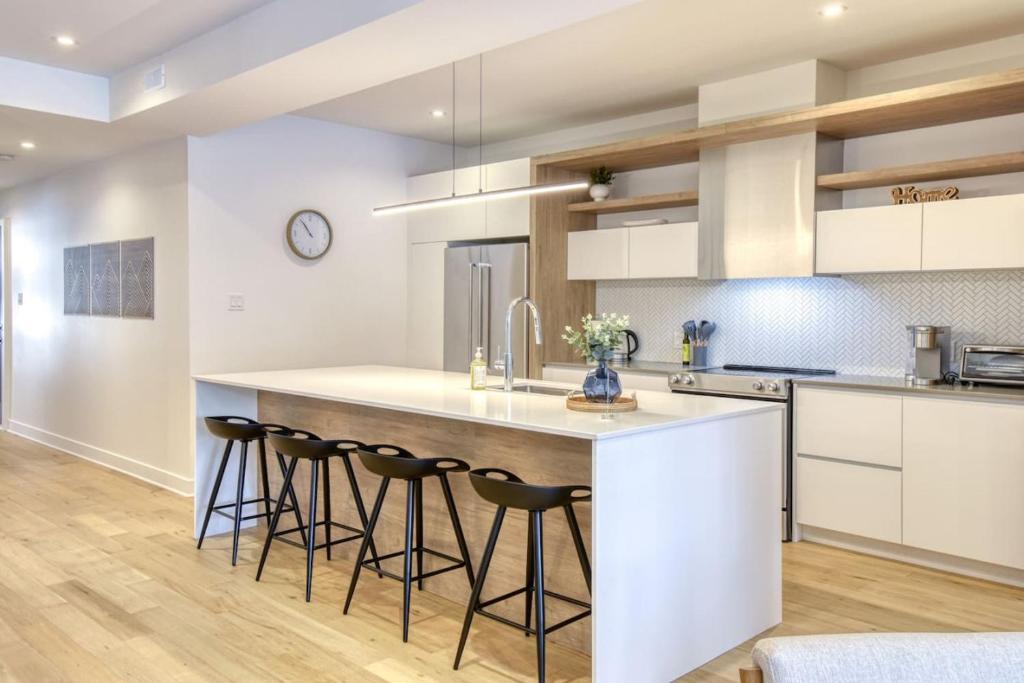 Kuchyň nebo kuchyňský kout v ubytování The Escape at Verbier - Modern Condo at Verbier Resort