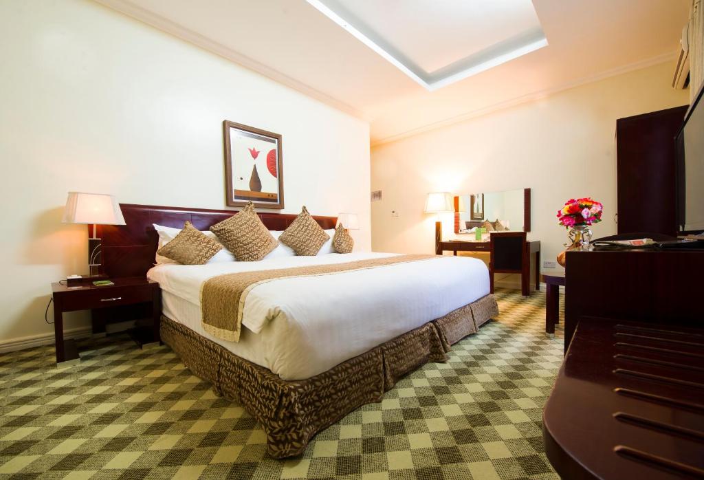The Manor Hotel - Deluxe Double Room (2 Adultos + 1 Niño)