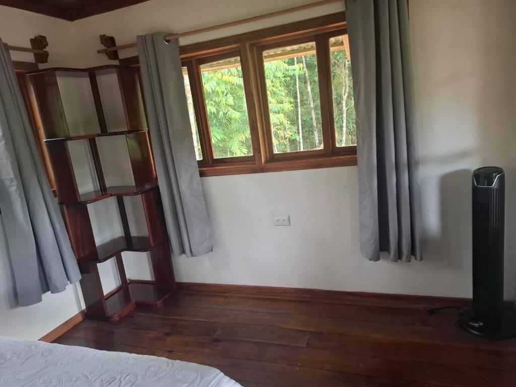 Postel nebo postele na pokoji v ubytování Casita Manakin