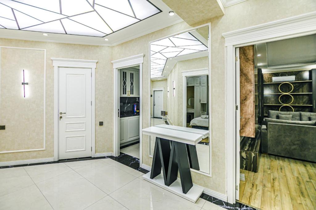 Η κουζίνα ή μικρή κουζίνα στο Khatai Deluxe Apartman