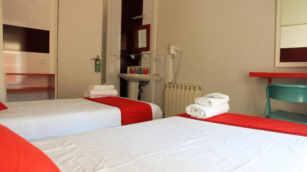 Postel nebo postele na pokoji v ubytování CH Antonio