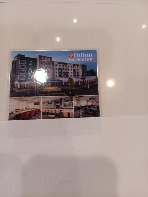 a picture of a hotel sign on a wall at Hilton Garden Inn in West Columbia