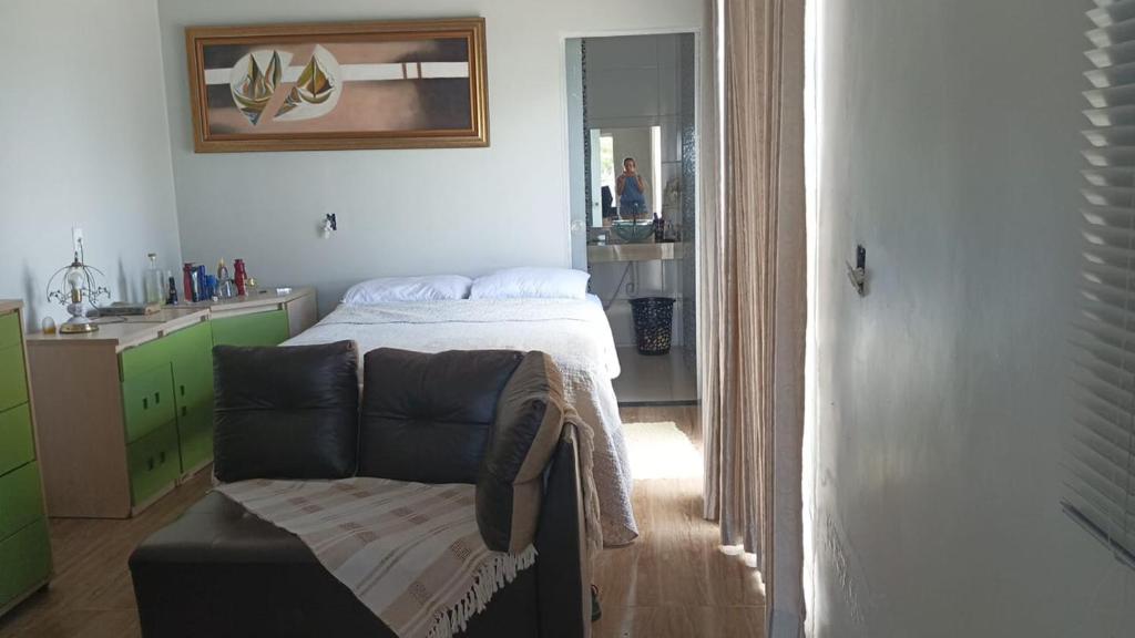 Postel nebo postele na pokoji v ubytování Rancho Serra do Ouro