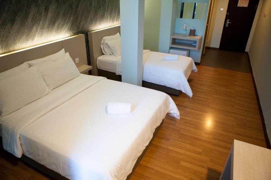 Postel nebo postele na pokoji v ubytování Inn86