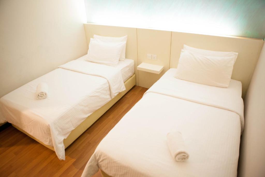 Postel nebo postele na pokoji v ubytování Inn86