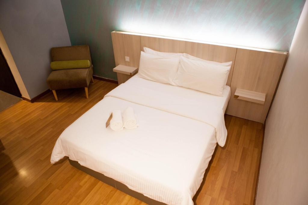 Postel nebo postele na pokoji v ubytování Inn86