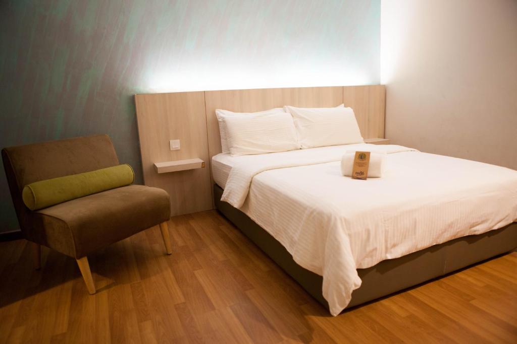 Postel nebo postele na pokoji v ubytování Inn86