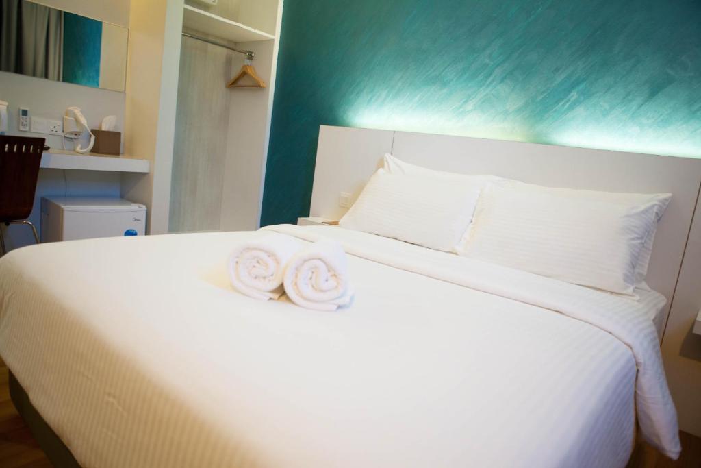 Postel nebo postele na pokoji v ubytování Inn86