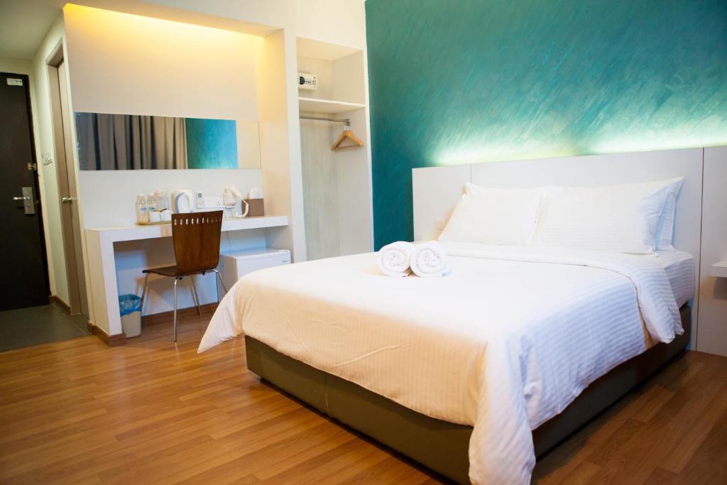 Postel nebo postele na pokoji v ubytování Inn86