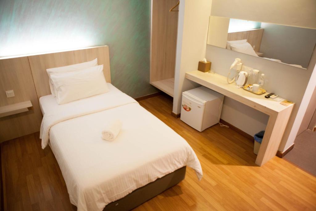 Postel nebo postele na pokoji v ubytování Inn86