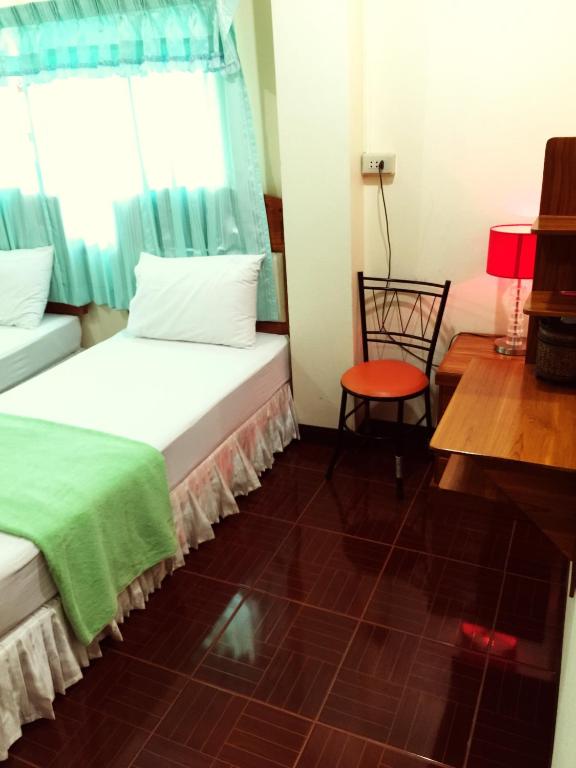 Postel nebo postele na pokoji v ubytování J-Safe Guesthouse