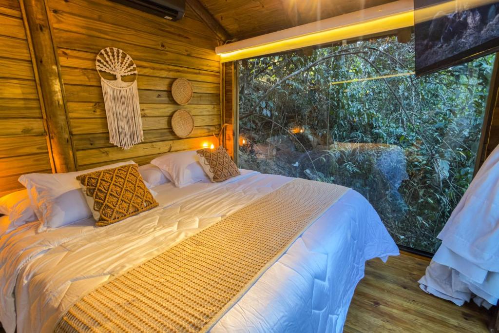 Postel nebo postele na pokoji v ubytování Cabana da mata