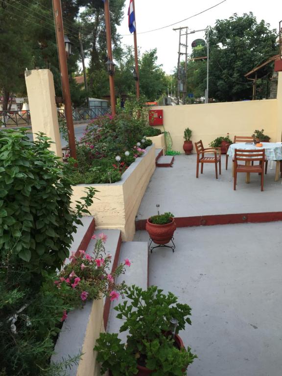 A garden outside Akanthos Hotel