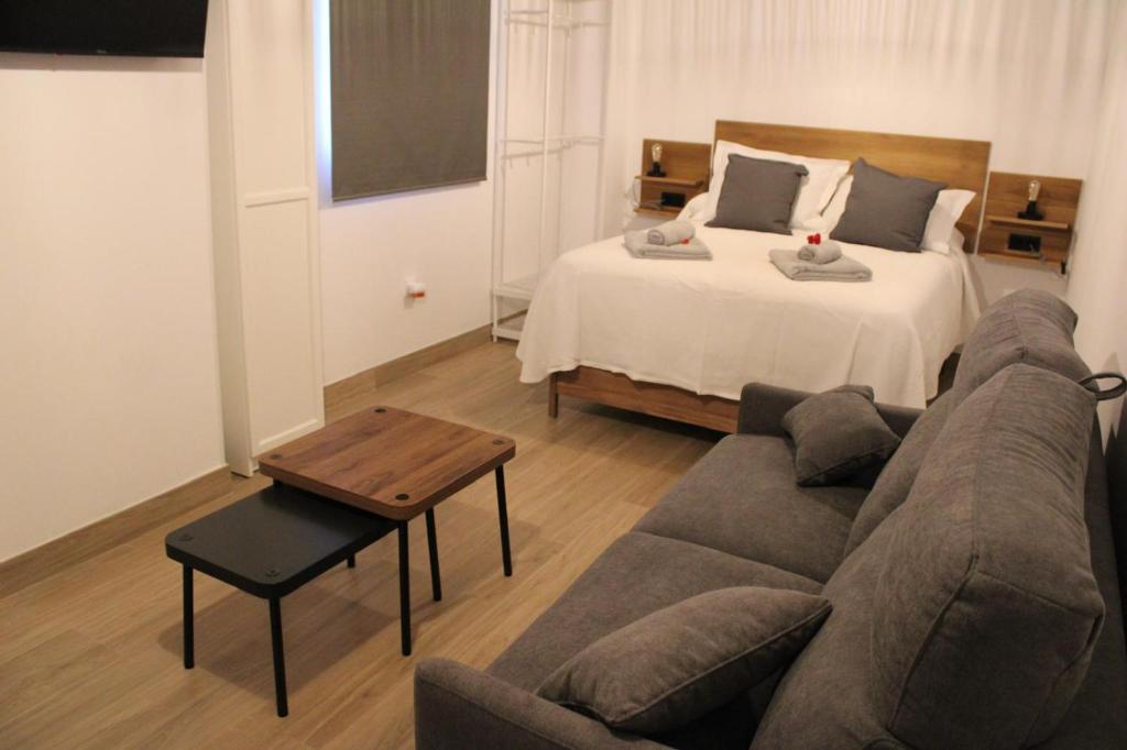 Postel nebo postele na pokoji v ubytování Apartamentos Sun 65