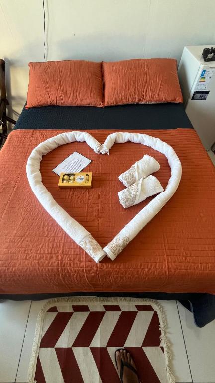 Voodi või voodid majutusasutuse Chalé Romântico em Araruama toas