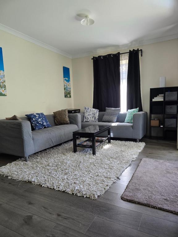 Posezení v ubytování R n M Guest House