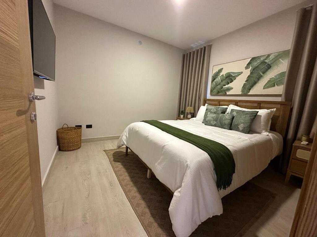 Giường trong phòng chung tại Garden Breeze Ghibli-Pool View