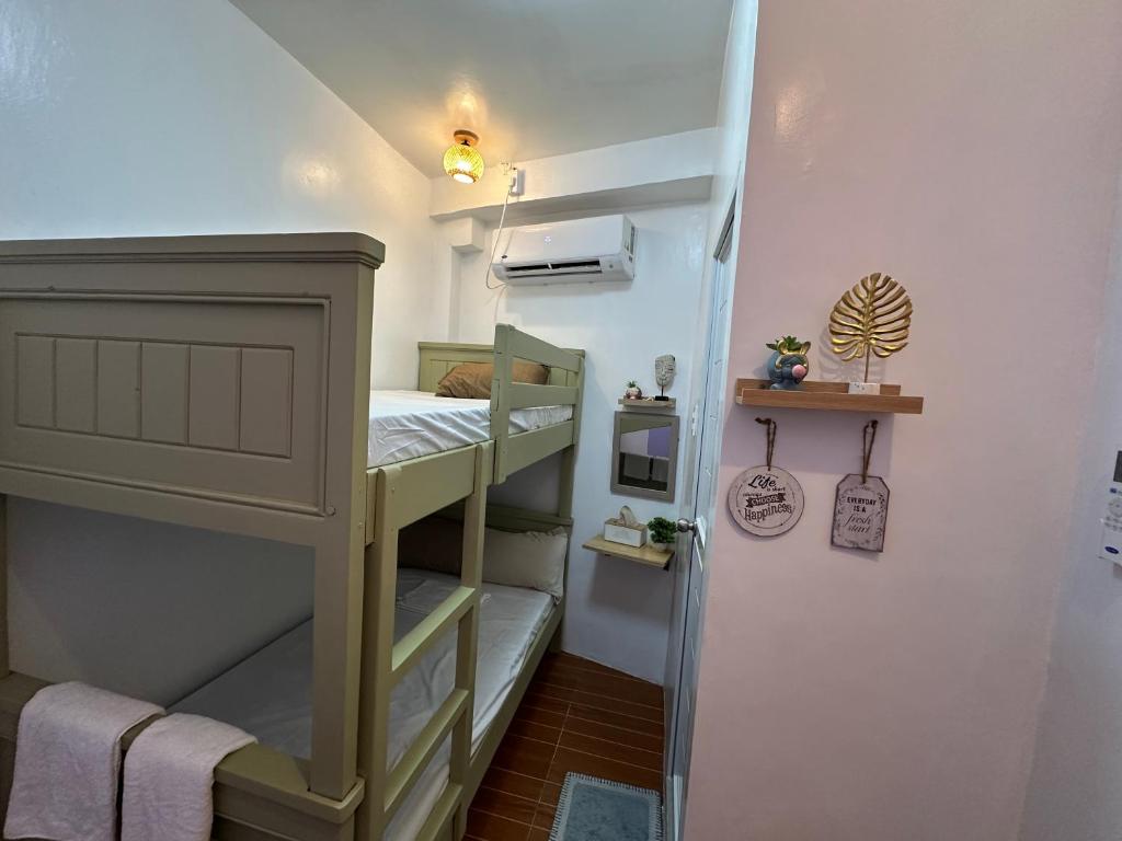 Ένα ή περισσότερα κρεβάτια σε δωμάτιο στο The ComfyNook Hostel