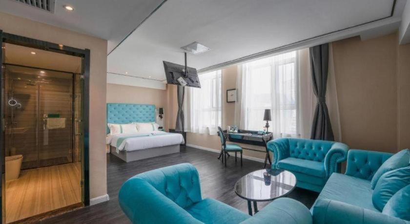 Postel nebo postele na pokoji v ubytování Xana Hotelle Ulanqab Municipal Government Wanda Plaza