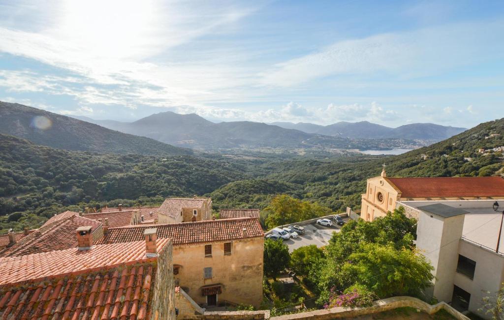 a view of the mountains from a building at 3 Bedroom Awesome Apartment In Olmeto in Olmeto