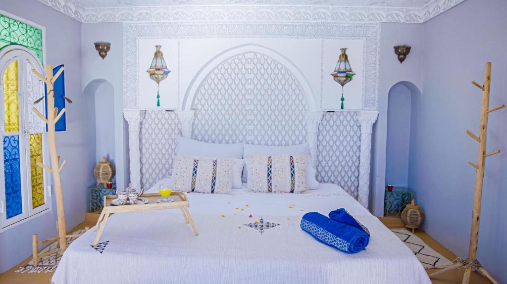 Ένα ή περισσότερα κρεβάτια σε δωμάτιο στο Villa Andaloussya, Majorel Host