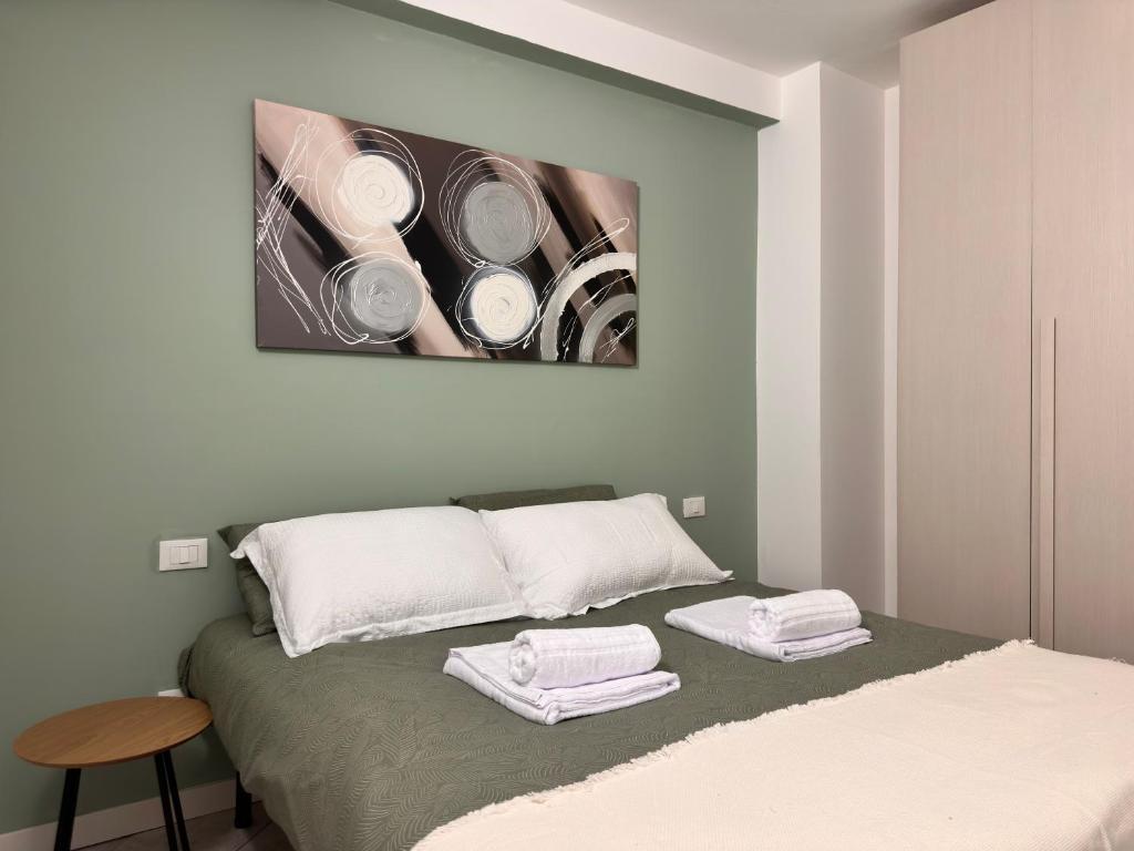 Postel nebo postele na pokoji v ubytování Sant Alessandro centralissimo Bilocale