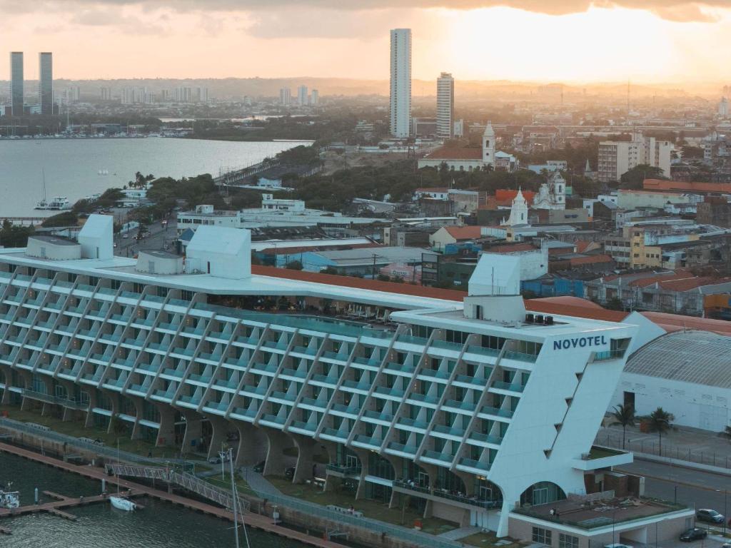a view of the royal caribbeans newest cruise ship at Novotel Recife Marina in Recife