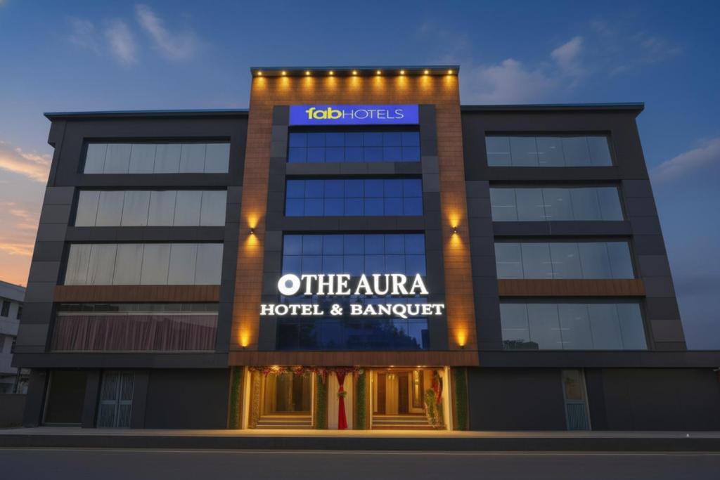 a building with a sign that reads office aura hotel and banquet at Hotel Rock View in New Delhi