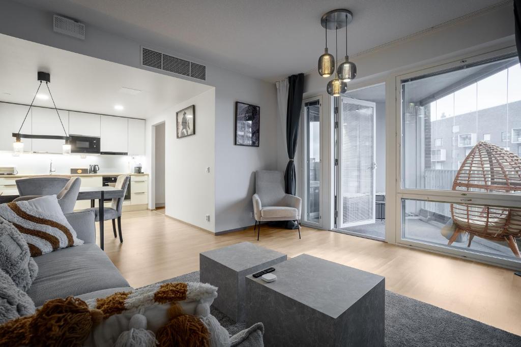 Χώρος καθιστικού στο Eco-apartment & balcony near Mall of Tripla, Helsinki
