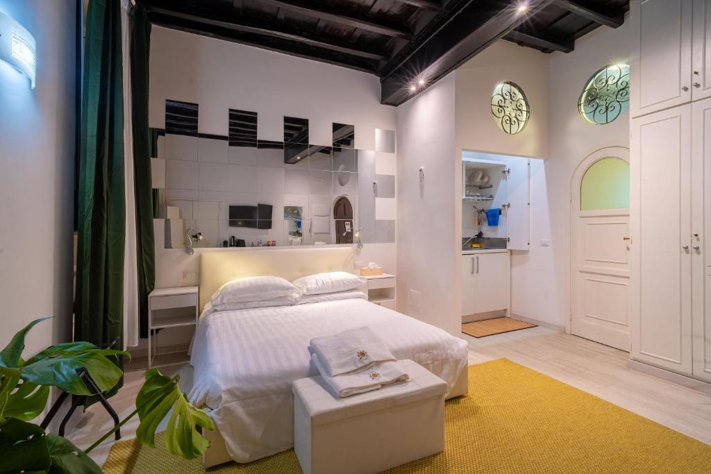 Ένα ή περισσότερα κρεβάτια σε δωμάτιο στο Luxury Trevi