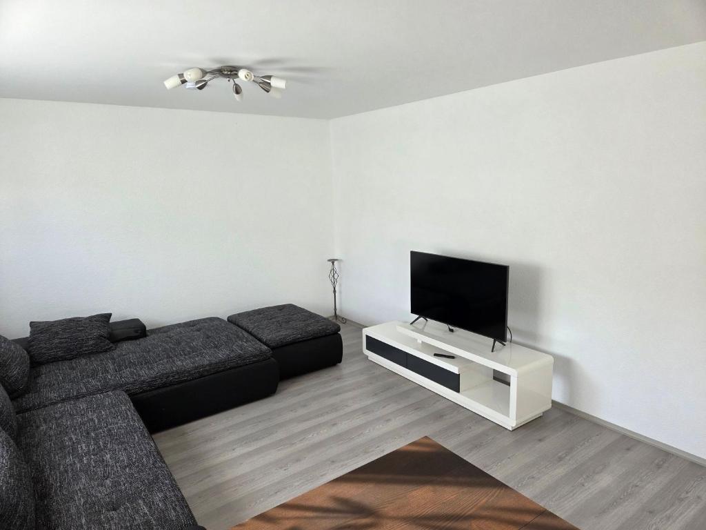 TV a/nebo společenská místnost v ubytování FeWo Timeout