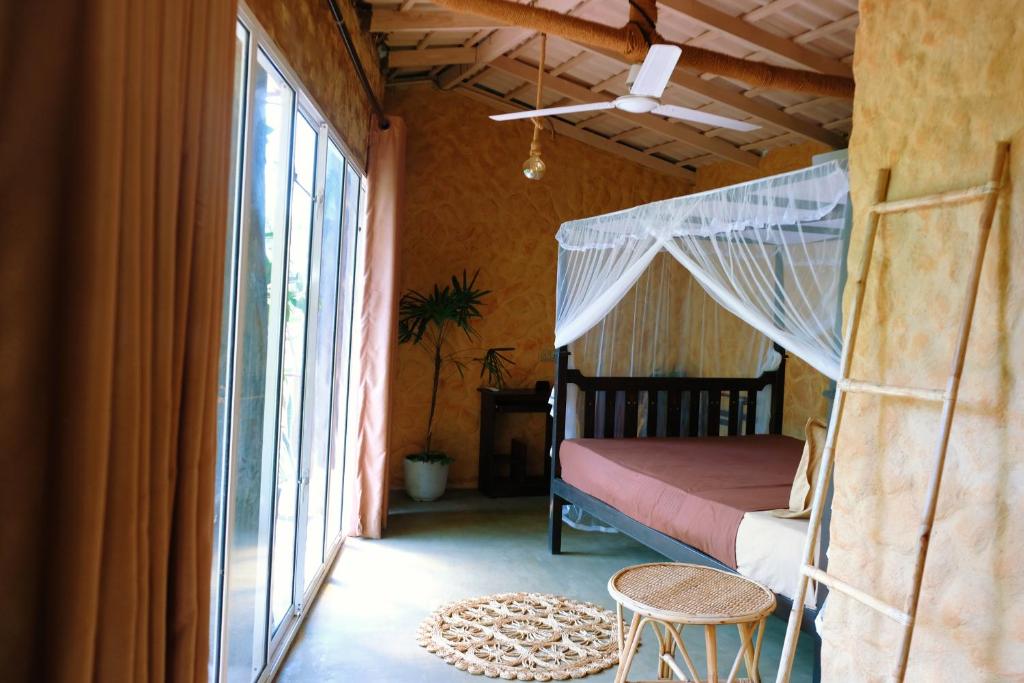 Ένα ή περισσότερα κρεβάτια σε δωμάτιο στο Salty Lune